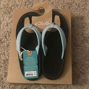 OluKai Black and Light Blue Sandals